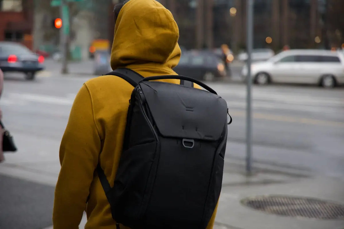 unknown person in yellow hoodie